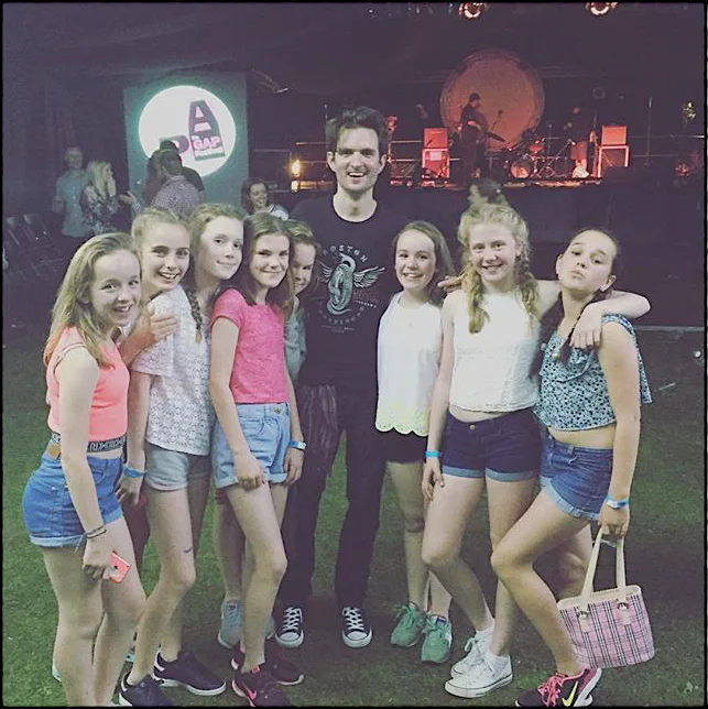 Chris Russell with students at a festival event